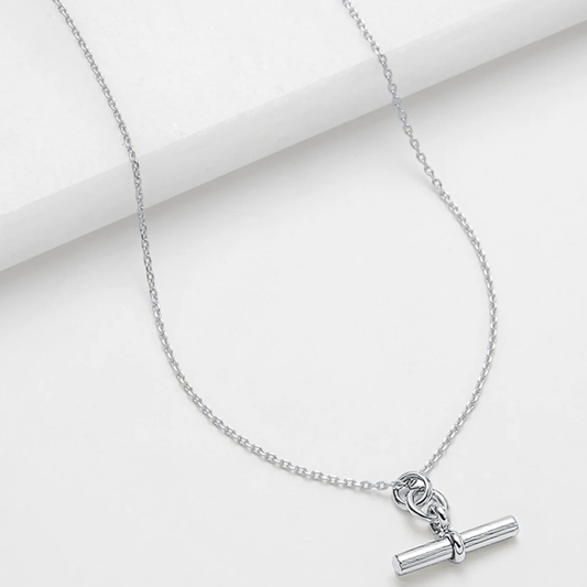 Silver necklace with a cylindrical pendant