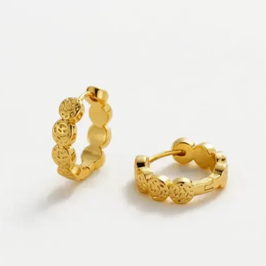 Gold textured hoop earrings