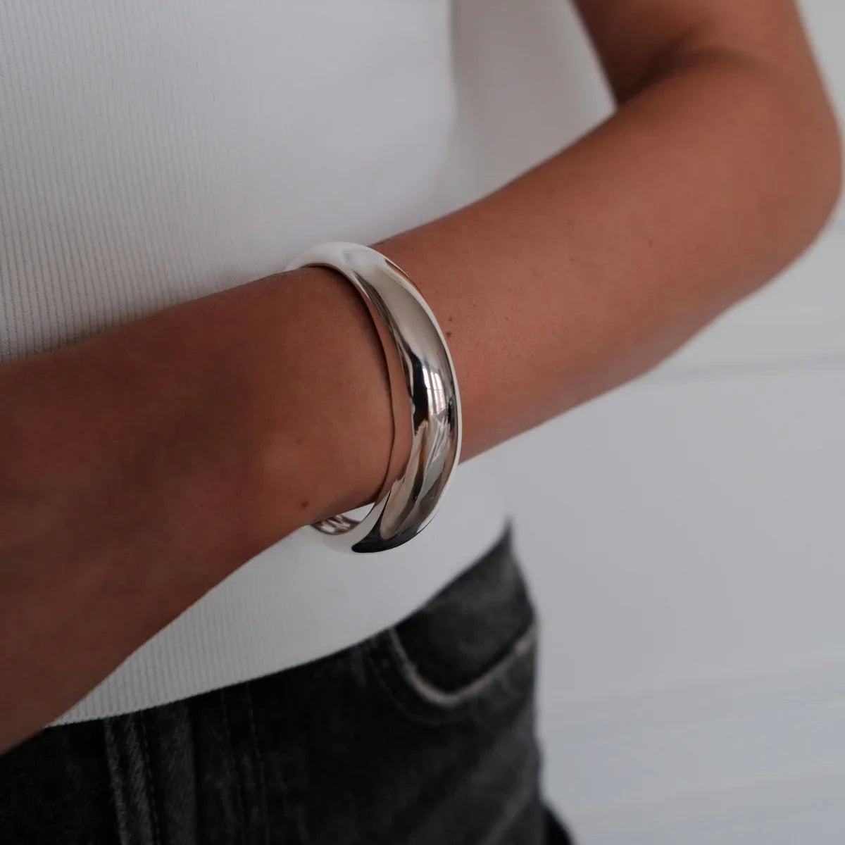 A silver bracelet with an opening 