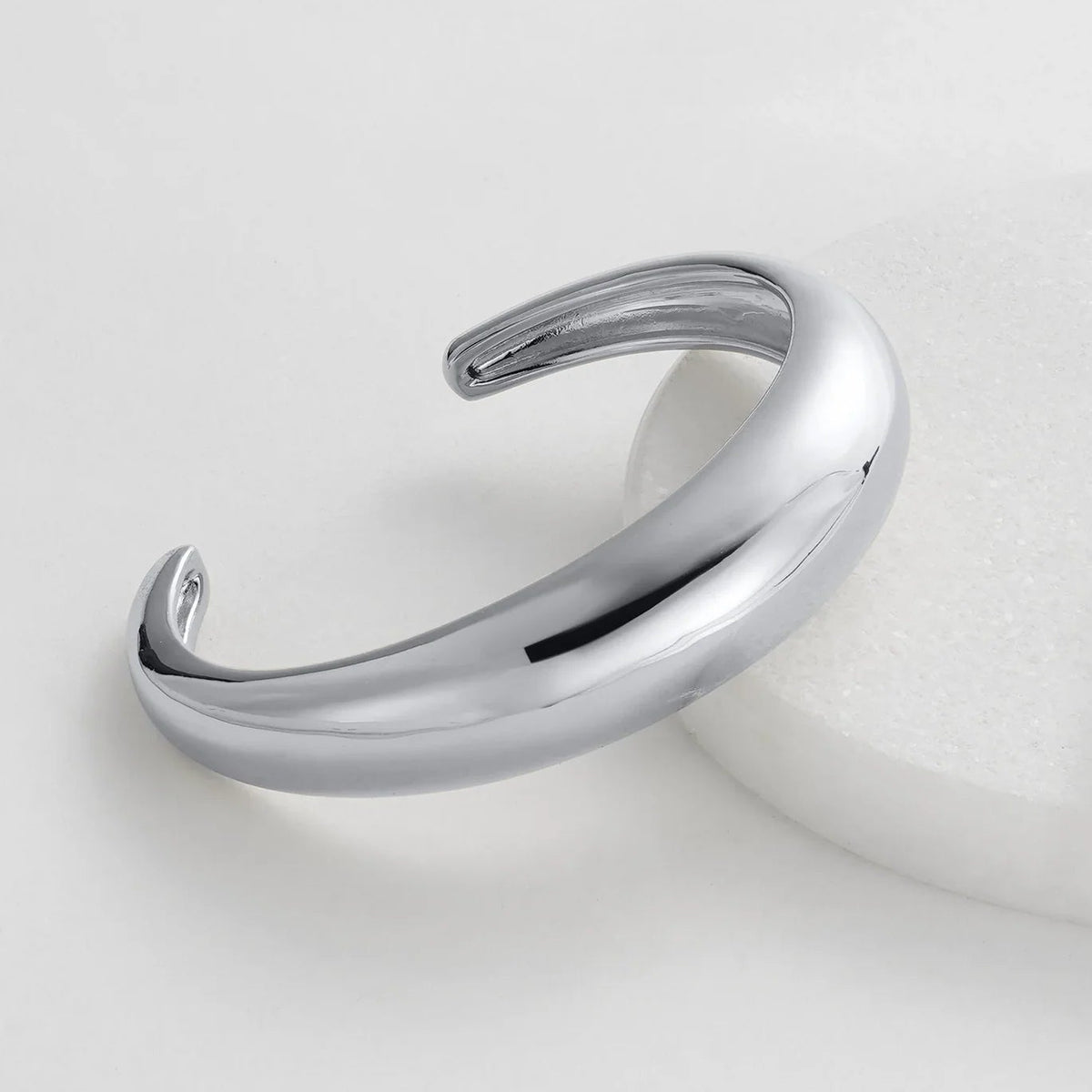 A silver bracelet with an opening 