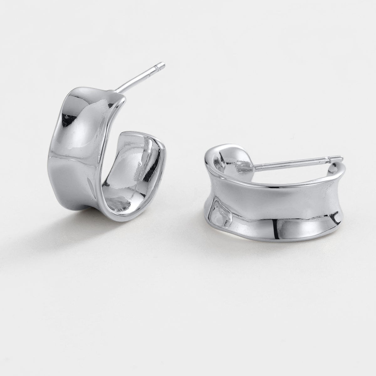 Thicker banding silver earings 