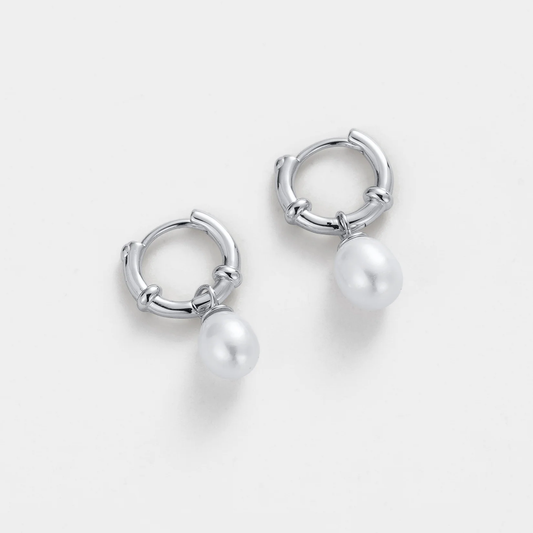 Silver hoop earrings with pearl charms