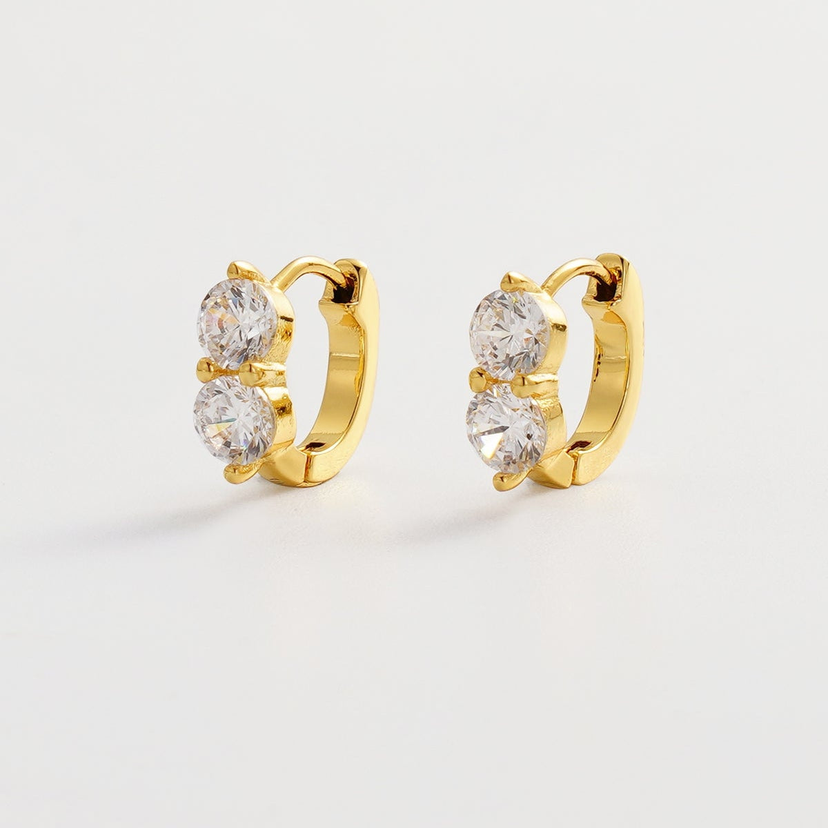Gold huggies with stones 