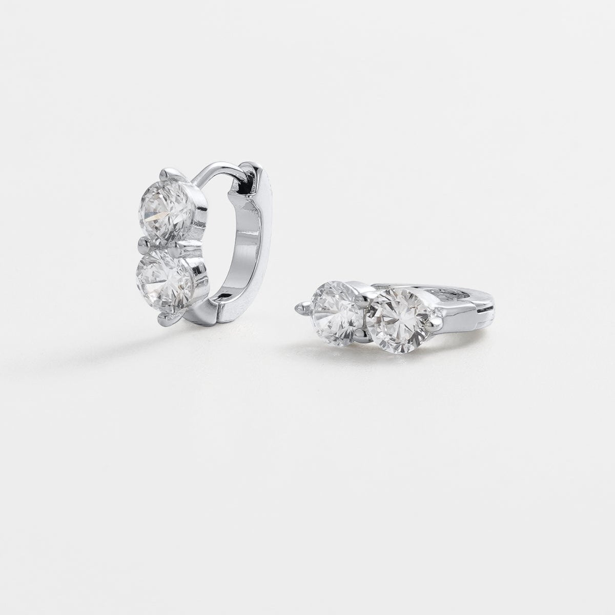 Silver huggie earringd 