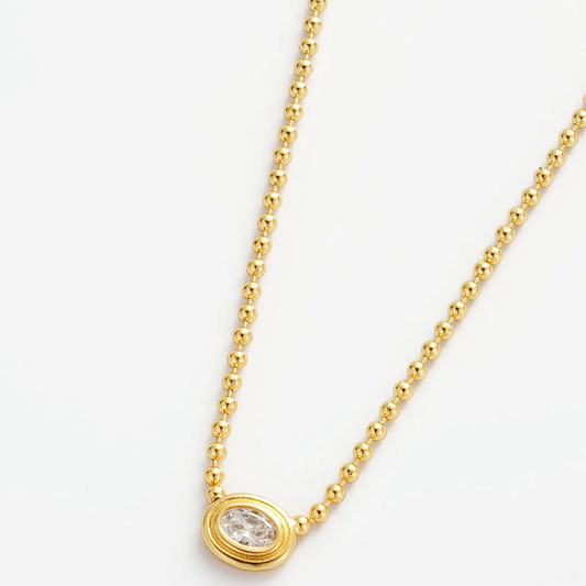 Gold necklace with a small diamond pendant 