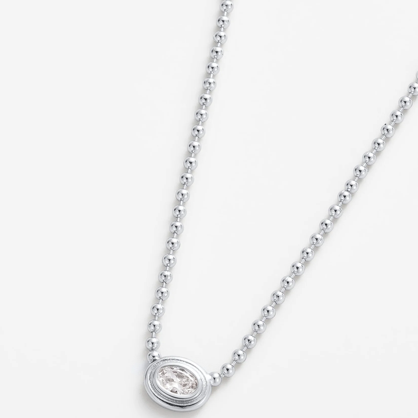 Silver necklace with a small diamond pendant