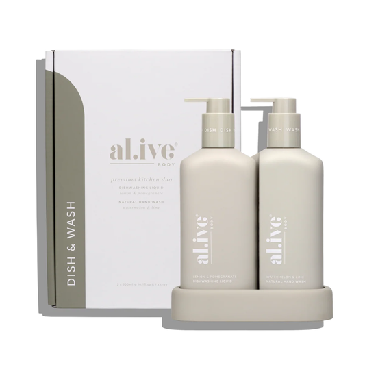 Two bottles of 'alive' dishwashing products with a box in the background on a white background