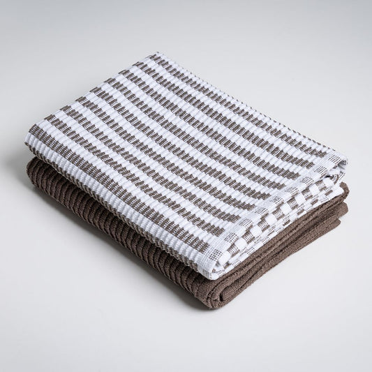 Stack of brown and white striped tea towles on a light gray background